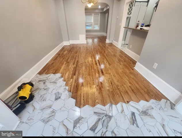 a view of entryway with wooden floor