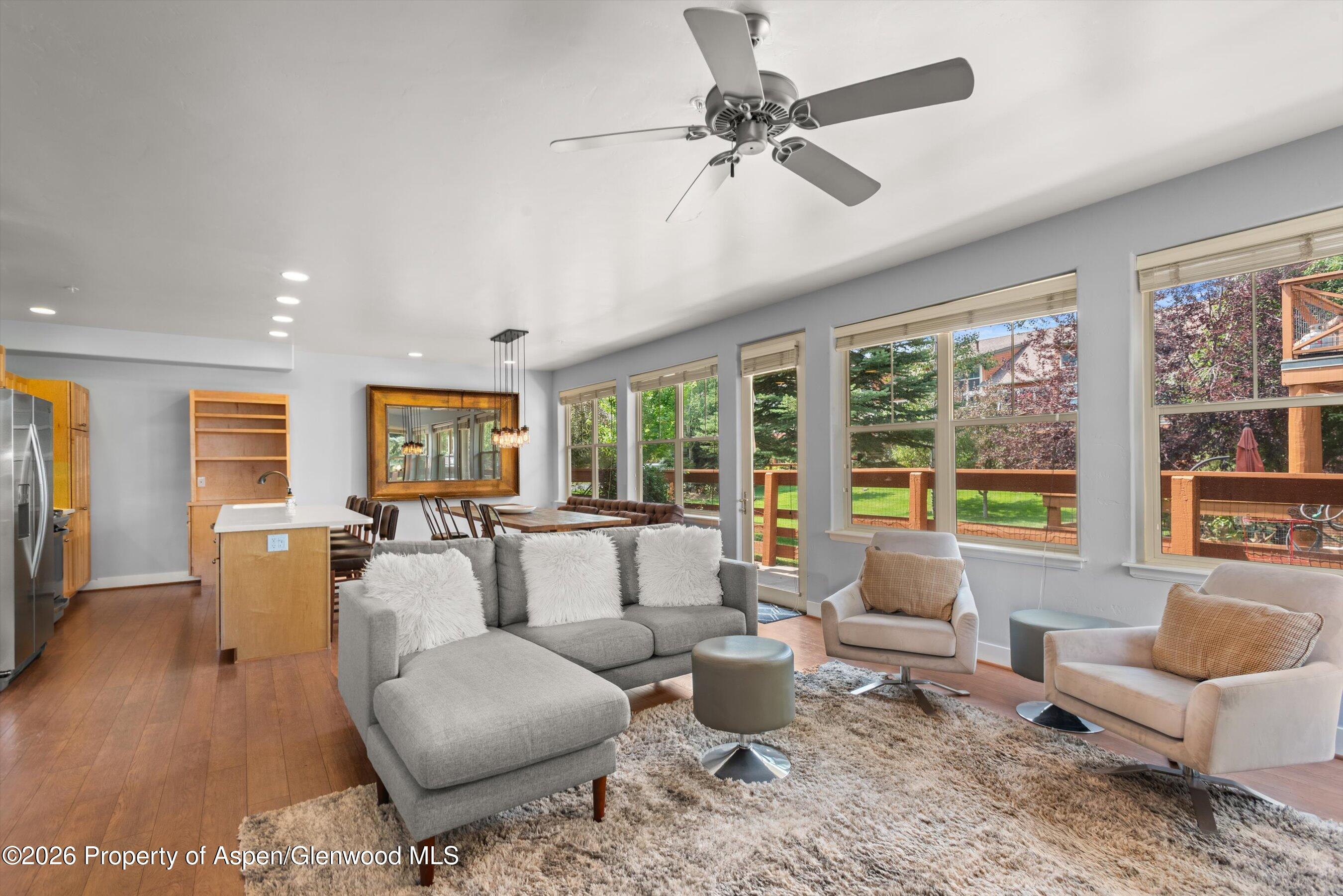 548 Evans Court Basalt, CO 81621 - Photo 1 of 36 a living room with furniture and large windows