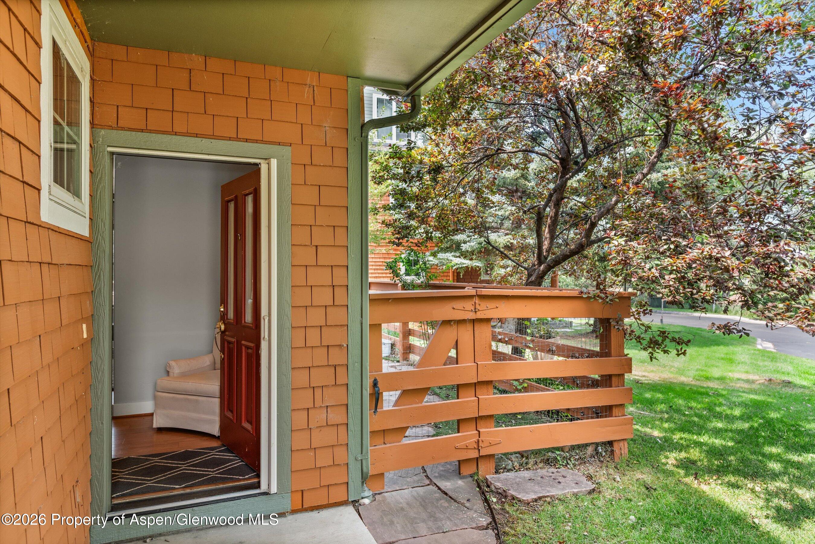 548 Evans Court Basalt, CO 81621 - Photo 16 of 36 a view of a wooden door and a yard