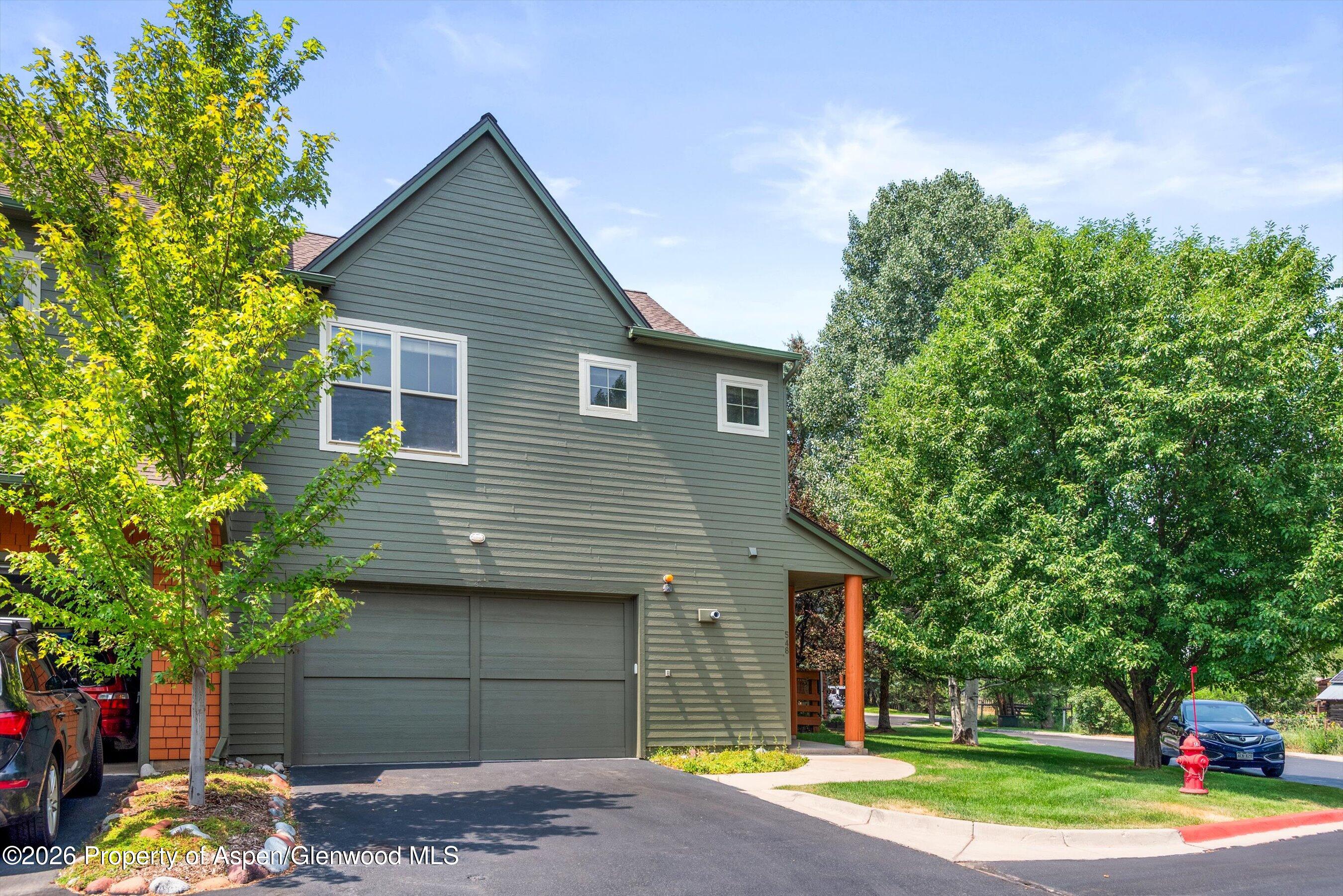548 Evans Court Basalt, CO 81621 - Photo 18 of 36 a front view of a house with a yard