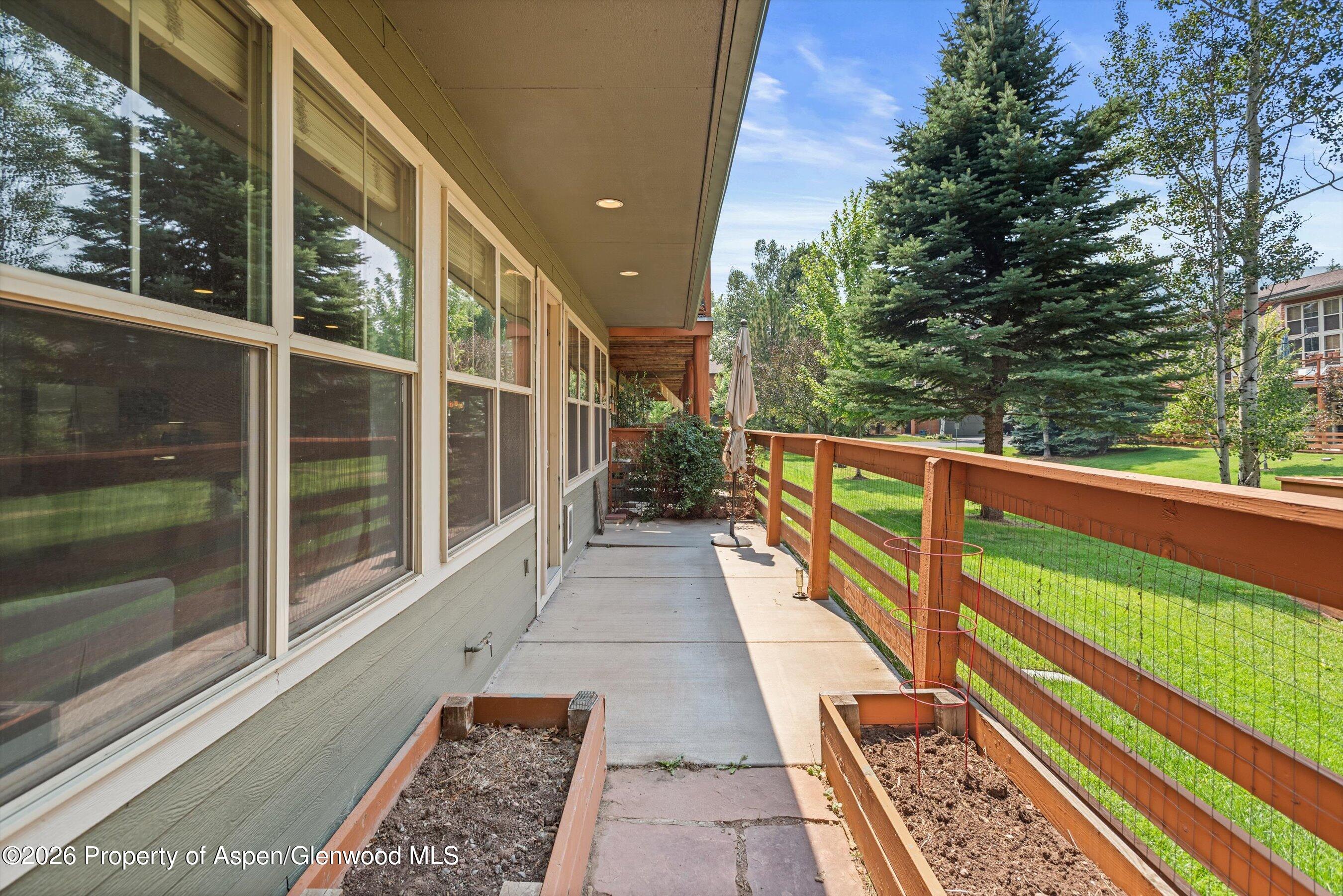 548 Evans Court Basalt, CO 81621 - Photo 21 of 36 a view of balcony with wooden floor and fence