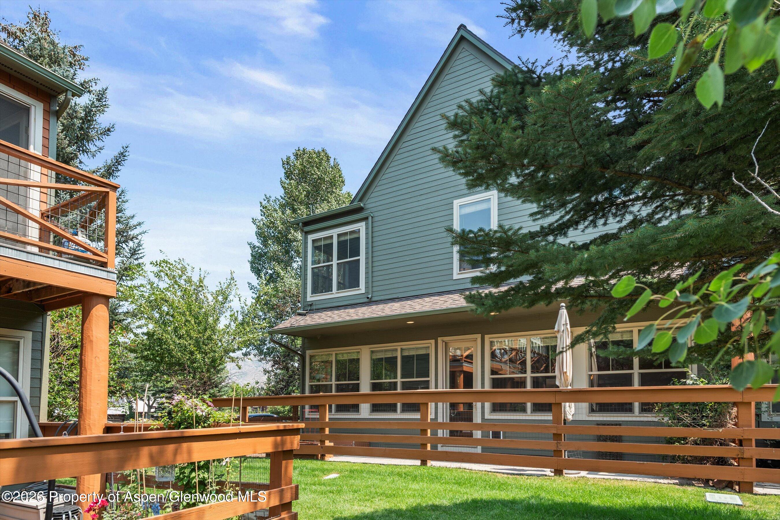 548 Evans Court Basalt, CO 81621 - Photo 23 of 36 a front view of a house with a yard