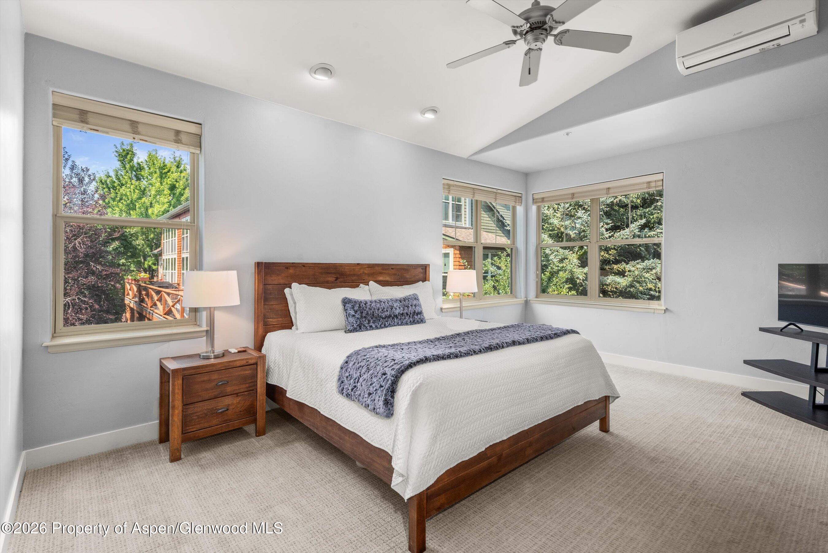 548 Evans Court Basalt, CO 81621 - Photo 24 of 36 a bedroom with a bed and a window