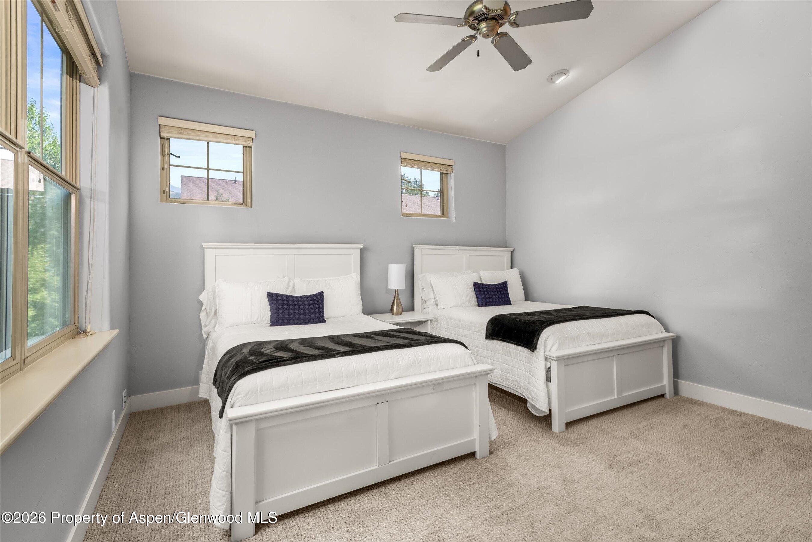 548 Evans Court Basalt, CO 81621 - Photo 31 of 36 a bedroom with bed and window