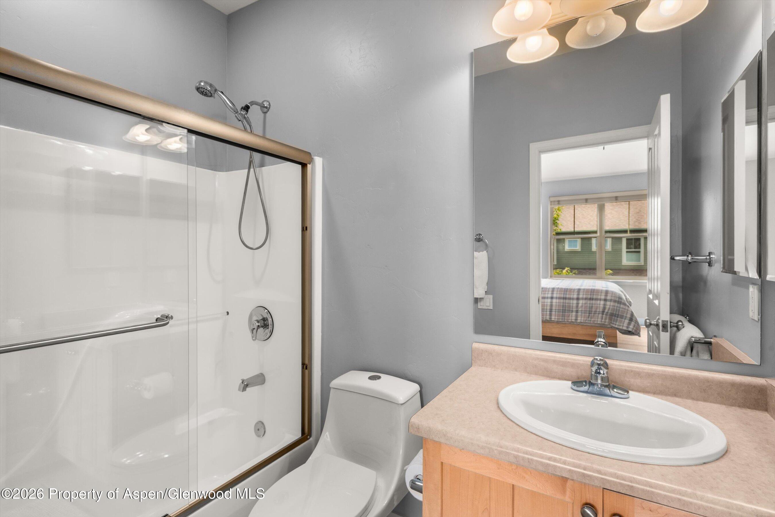 548 Evans Court Basalt, CO 81621 - Photo 34 of 36 a bathroom with a sink toilet and shower
