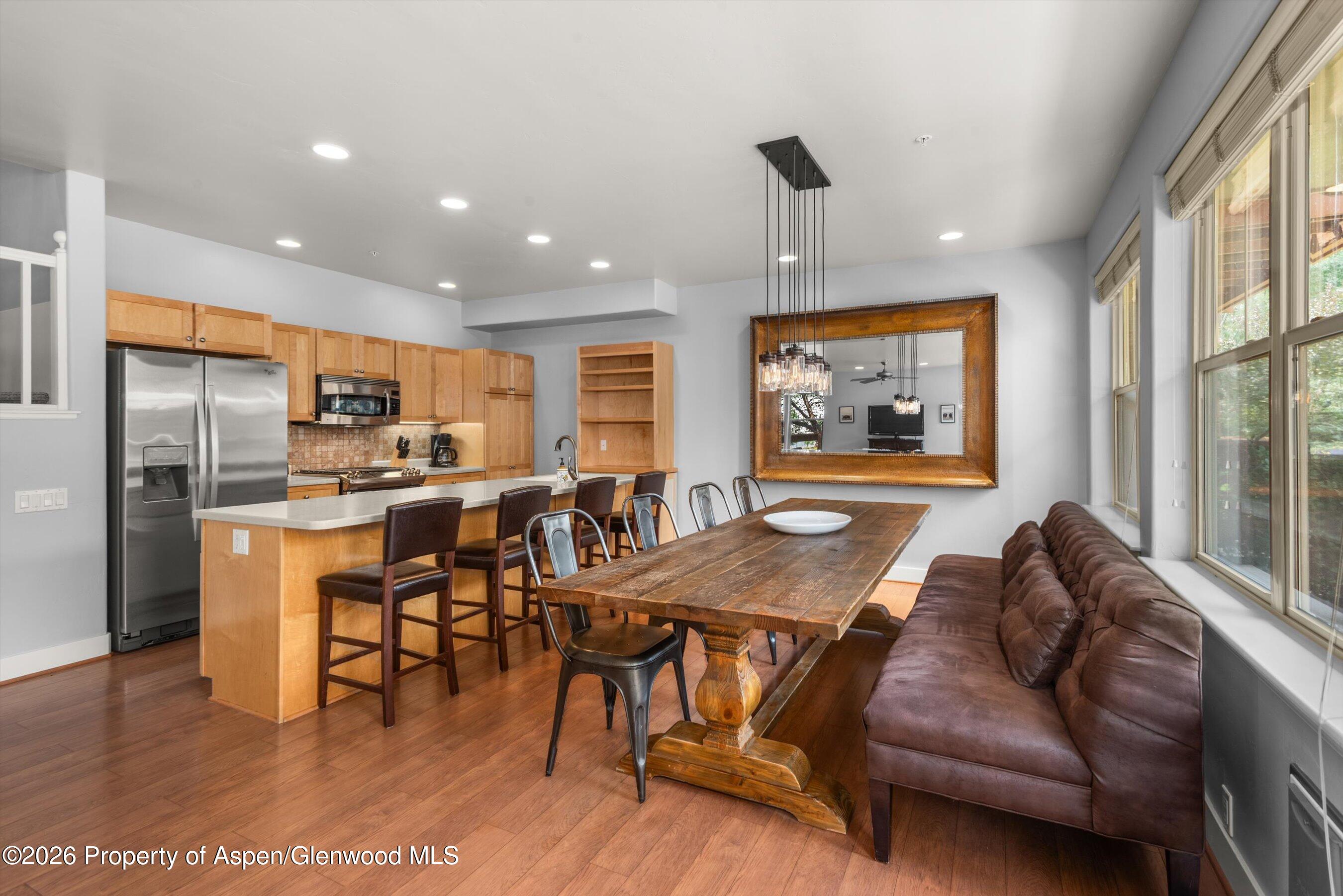 548 Evans Court Basalt, CO 81621 - Photo 10 of 36 a living room with stainless steel appliances granite countertop furniture and a wooden floor