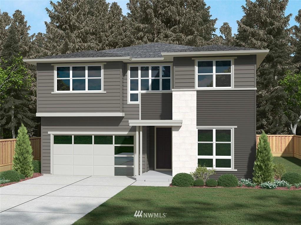 311 Field Place Southeast Renton, WA 98059 - Photo 1 of 8 a house view with a garden space