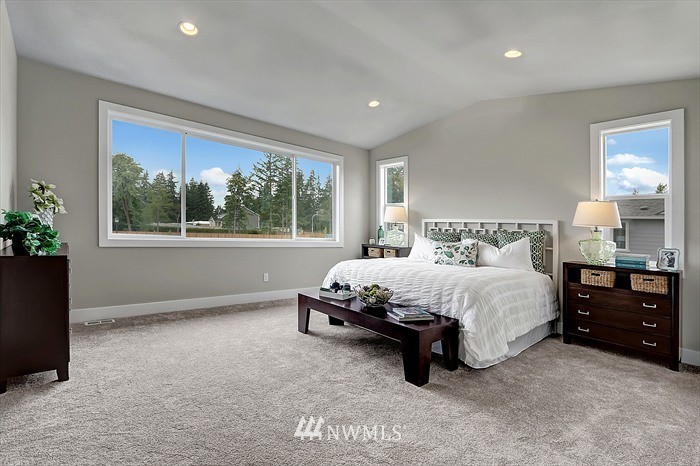 311 Field Place Southeast Renton, WA 98059 - Photo 8 of 8 a spacious bedroom with a bed and window