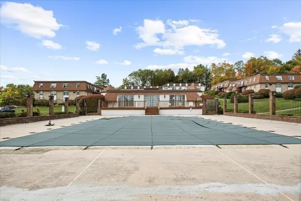 a view of a street with a building in the background