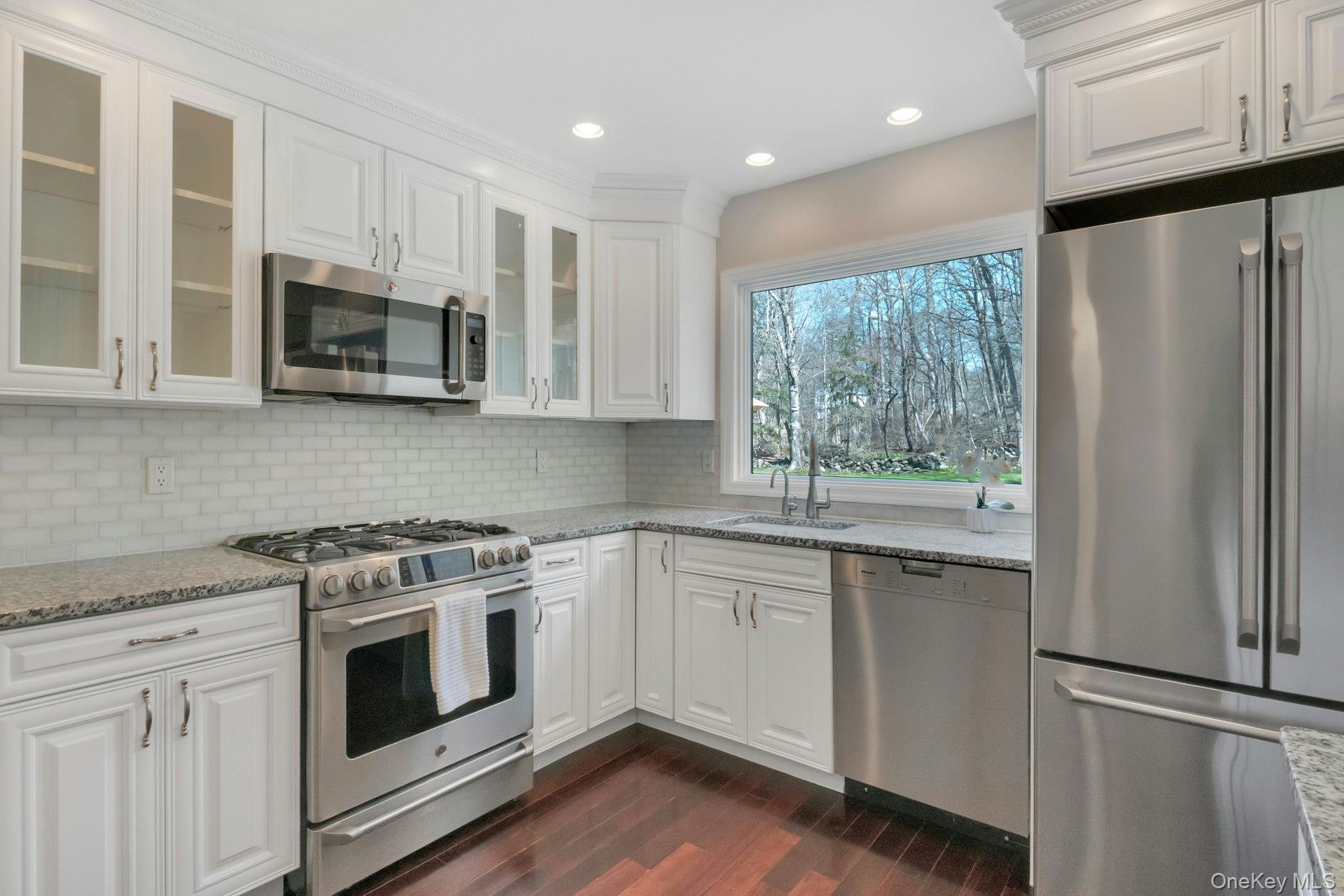 61 Schrade Road Briarcliff Manor, NY 10510 - Photo 11 of 39 Updated kitchen with chef quality stainless steel appliances.