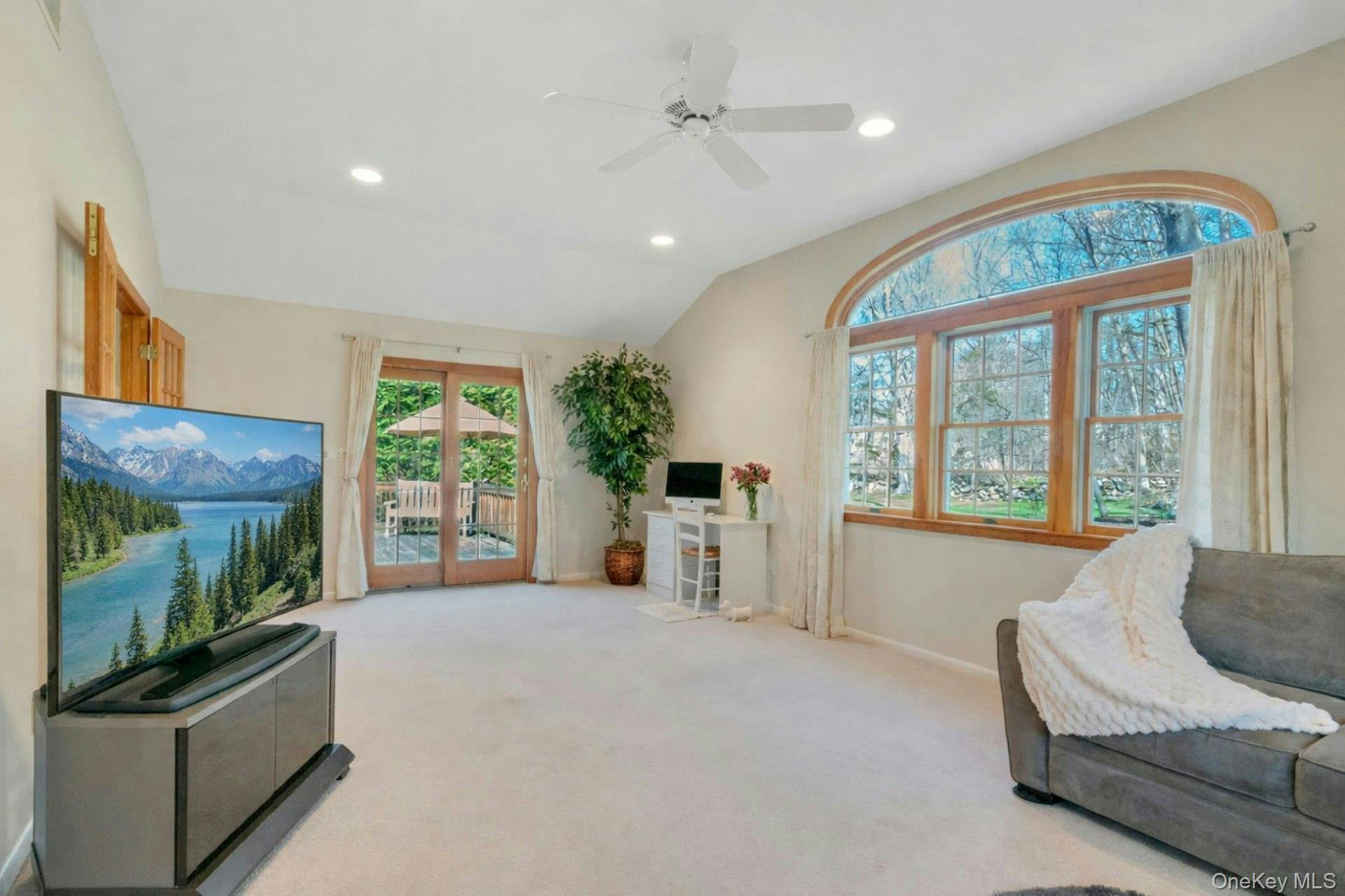 61 Schrade Road Briarcliff Manor, NY 10510 - Photo 16 of 39 Spacious multi-use family room with large window overlooking serene backyard.