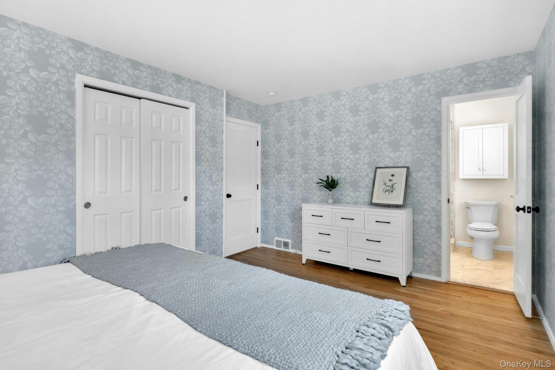 61 Schrade Road Briarcliff Manor, NY 10510 - Photo 20 of 39 Reverse view of primary bedroom with door to ensuite bath visible.