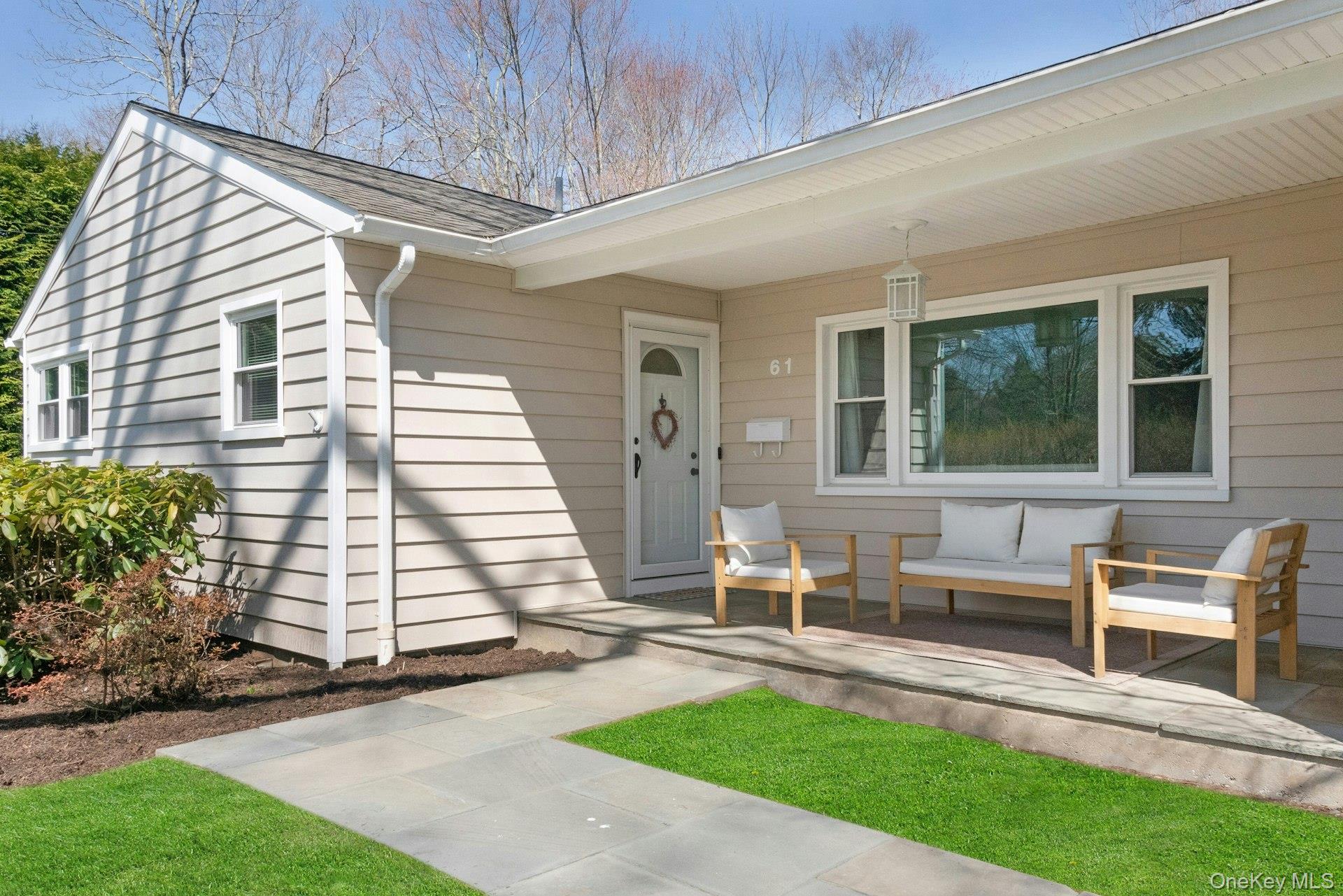 61 Schrade Road Briarcliff Manor, NY 10510 - Photo 2 of 39 Relax on fine spring days on the front porch.