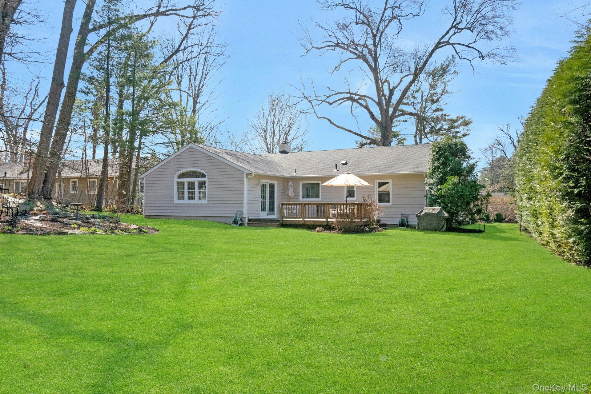 61 Schrade Road Briarcliff Manor, NY 10510 - Photo 28 of 39 Looking back at the house & deck from the yard