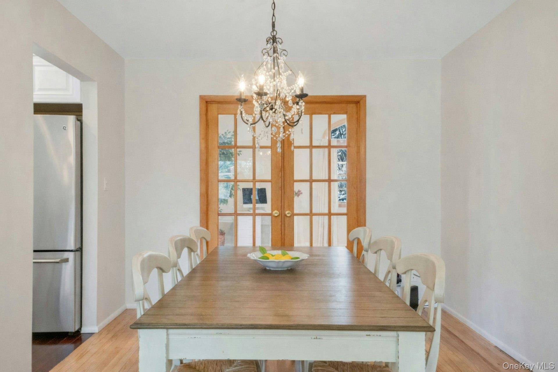 61 Schrade Road Briarcliff Manor, NY 10510 - Photo 8 of 39 Double French Doors offer privacy for the Family room off Dining area.