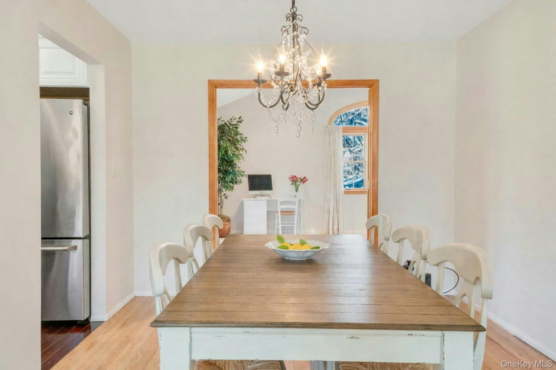 61 Schrade Road Briarcliff Manor, NY 10510 - Photo 9 of 39 View from dining area into large family room with double French doors open.
