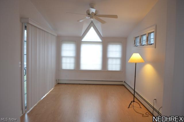 1st floor family room with vaulted ceiling and sliding doors to the rear yard.