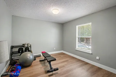 a view of a room with gym equipment