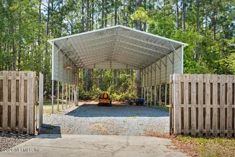 a blue bench sitting in front of a house