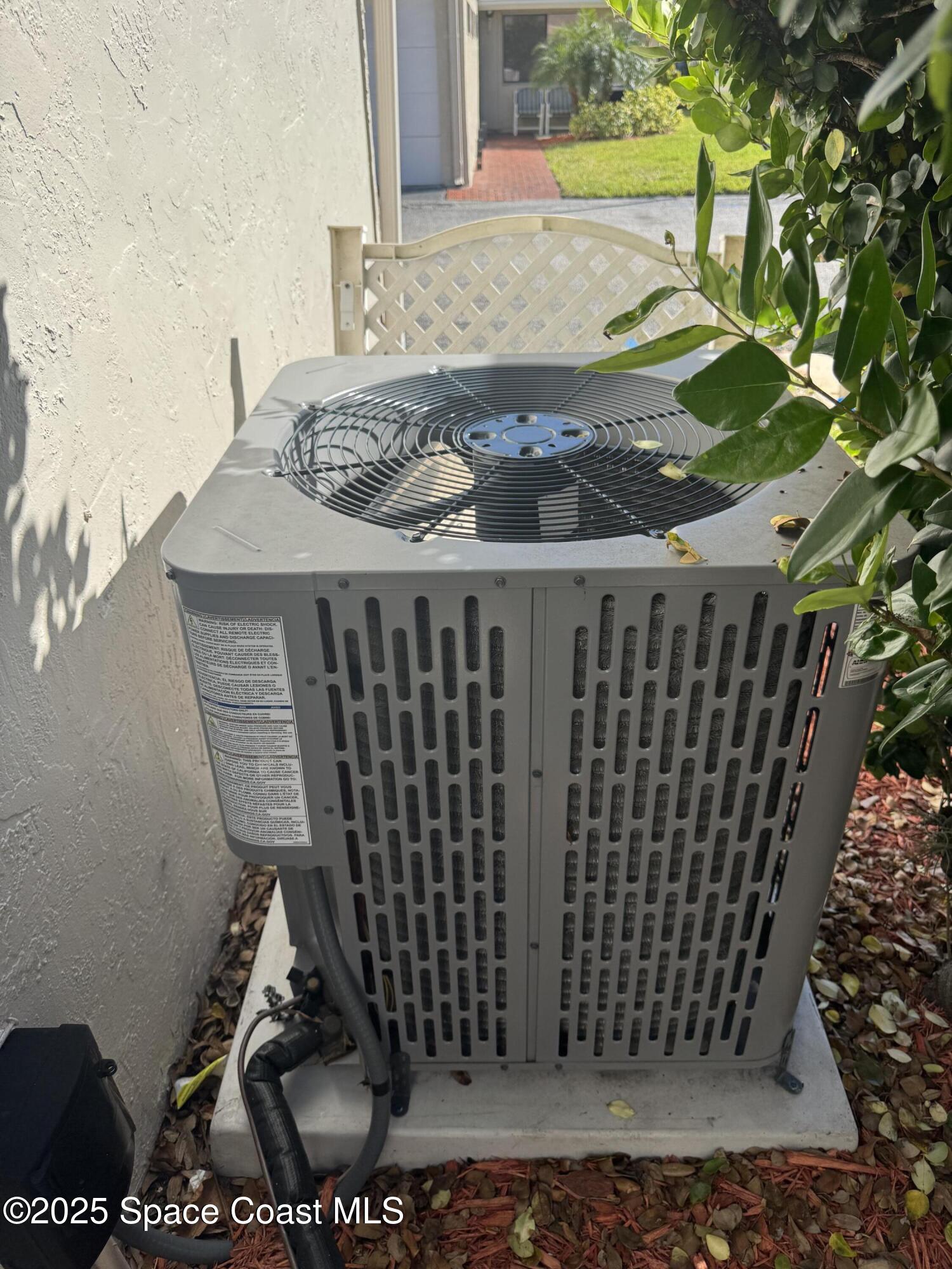 212 Augusta Way Melbourne, FL 32940 - Photo 16 of 49 a view of a backyard with sitting area