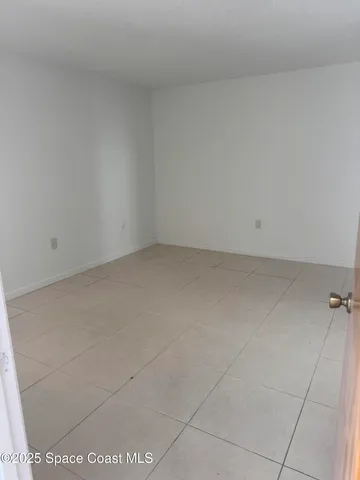 a view of small space with racks on the wall