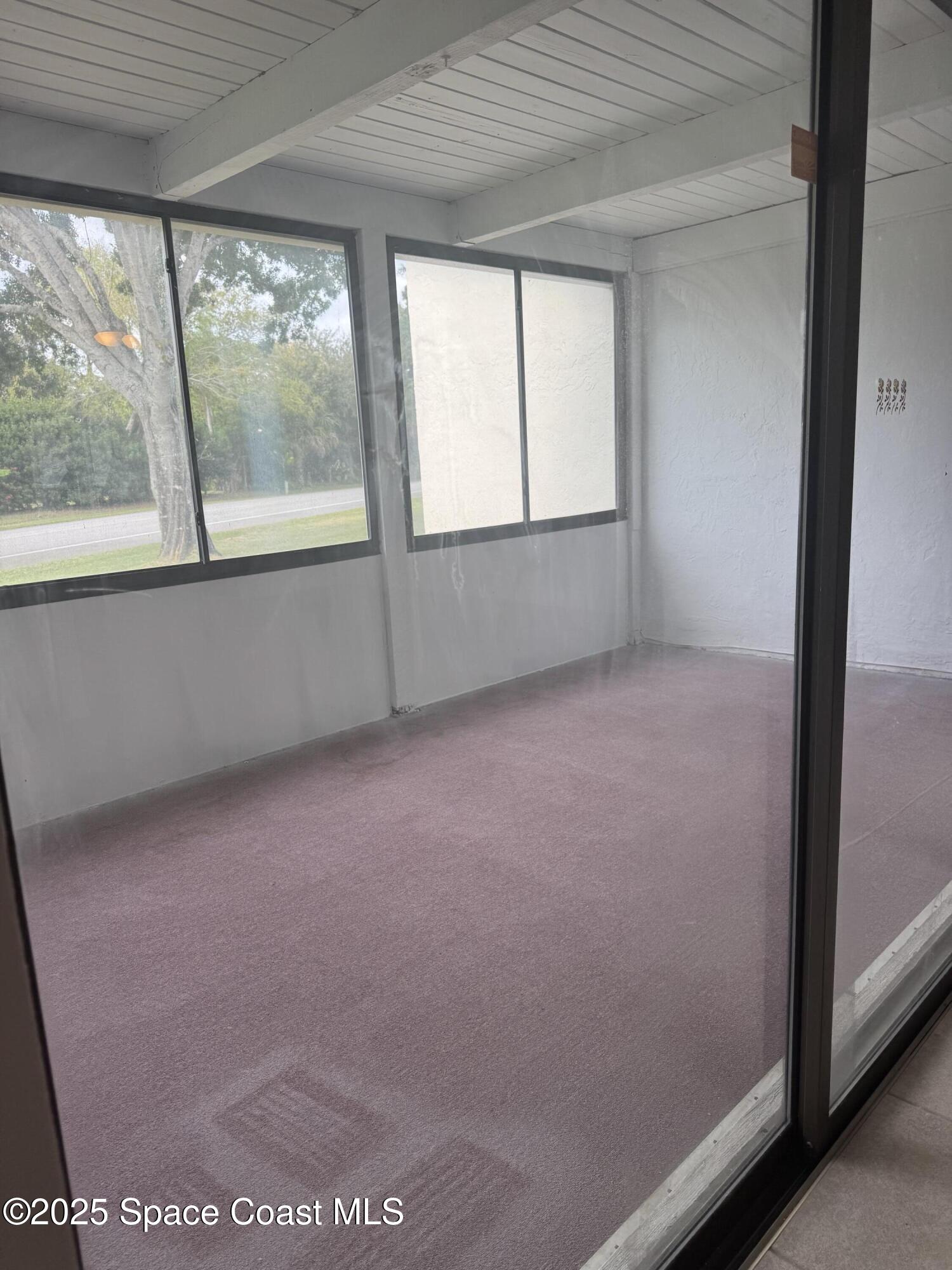 212 Augusta Way Melbourne, FL 32940 - Photo 29 of 49 an empty room with windows