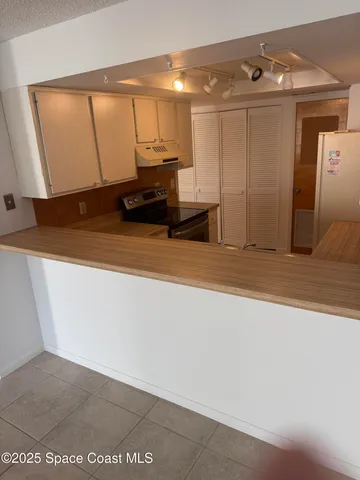 a view of a livingroom with an empty space