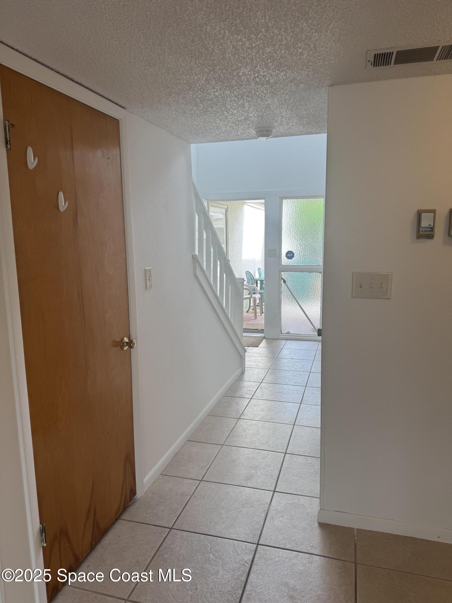 212 Augusta Way Melbourne, FL 32940 - Photo 33 of 49 a view of a hallway