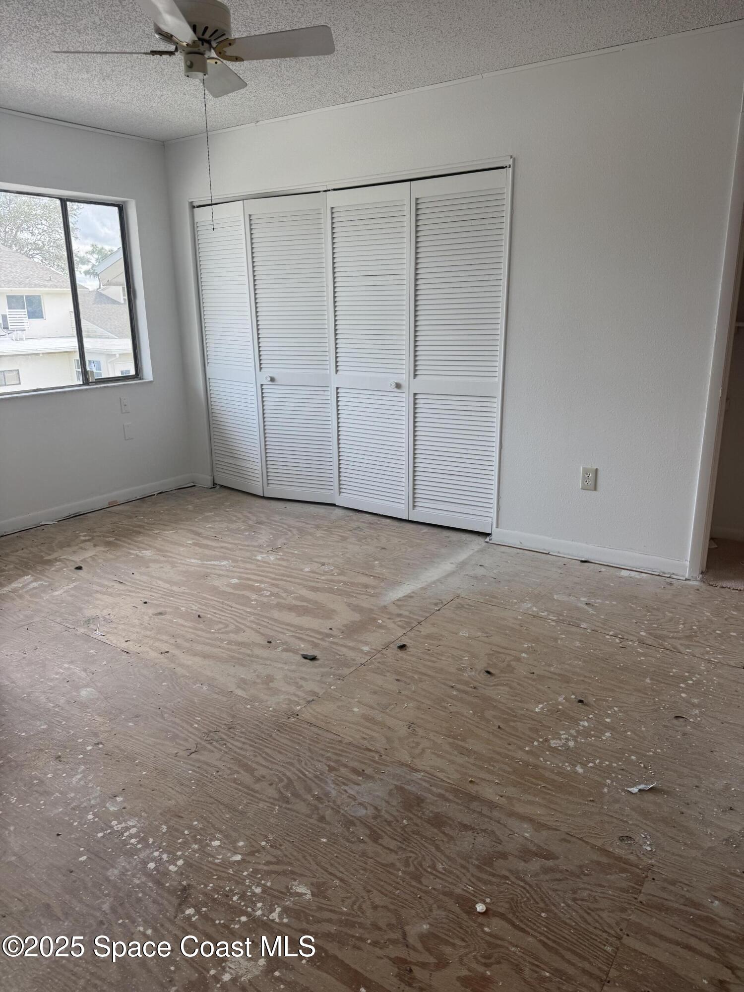 212 Augusta Way Melbourne, FL 32940 - Photo 37 of 49 an empty room with windows