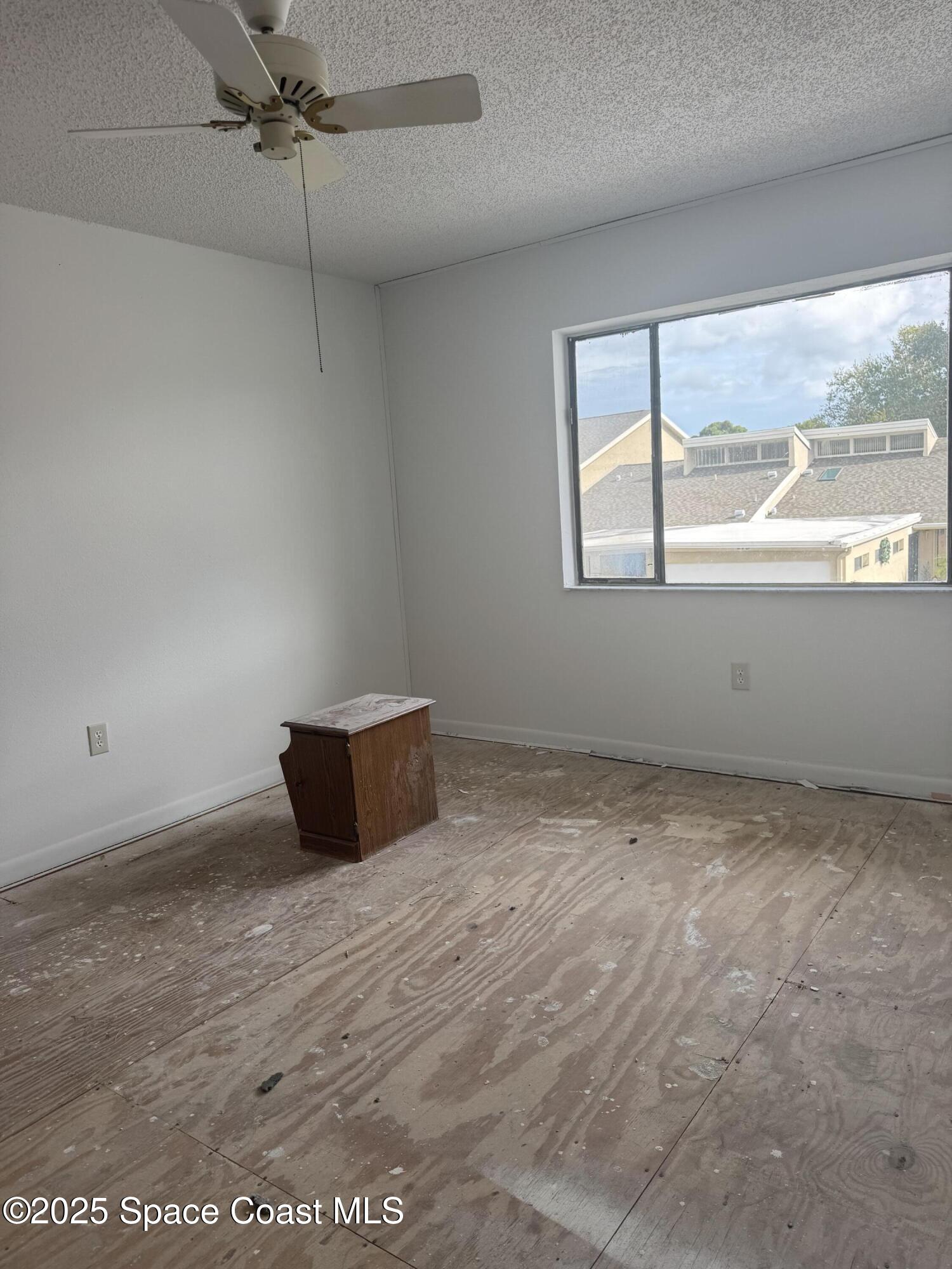 212 Augusta Way Melbourne, FL 32940 - Photo 40 of 49 an empty room with a window