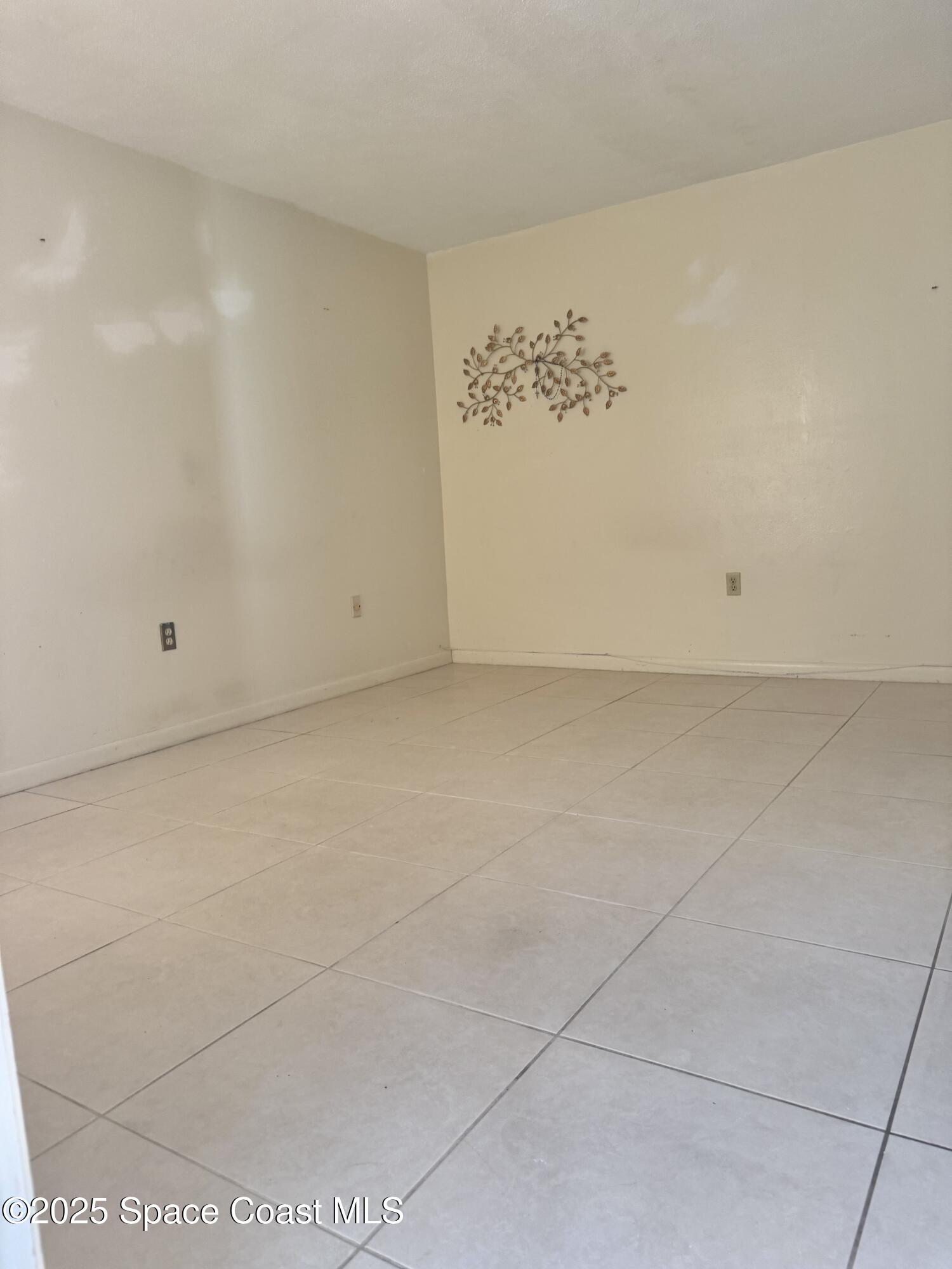 212 Augusta Way Melbourne, FL 32940 - Photo 4 of 49 a view of an empty room