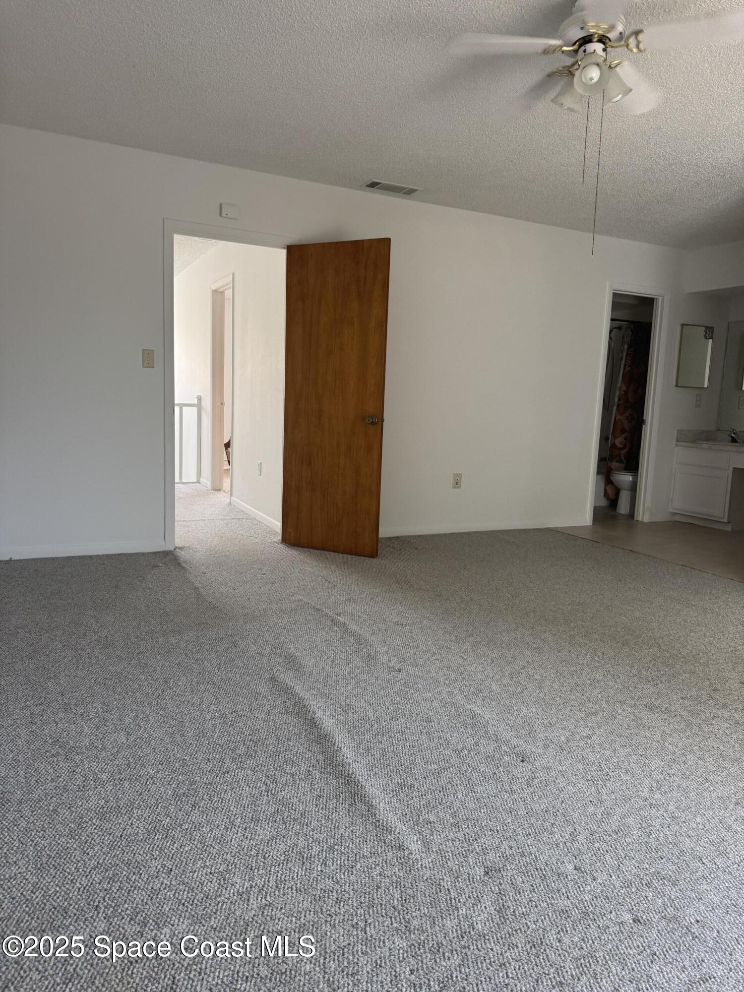 212 Augusta Way Melbourne, FL 32940 - Photo 42 of 49 a view of an empty room