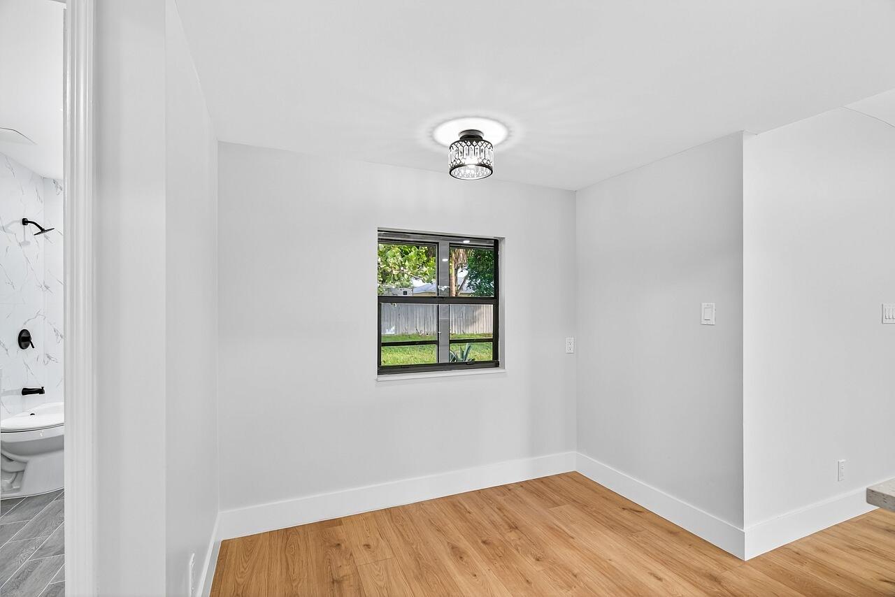 117 High Court Sebastian, FL 32958 - Photo 22 of 54 a view of a hallway with a window
