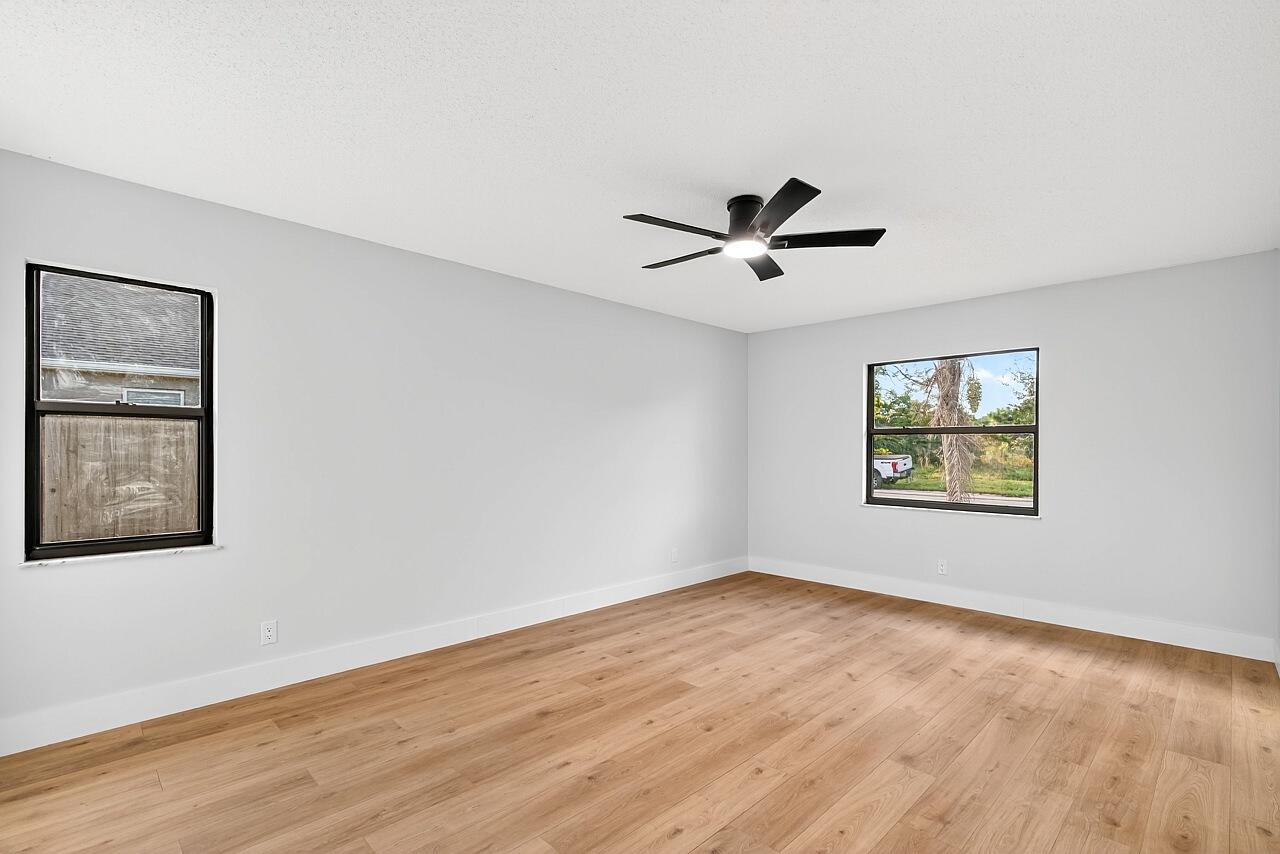 117 High Court Sebastian, FL 32958 - Photo 25 of 54 a view of room with window and wooden floor