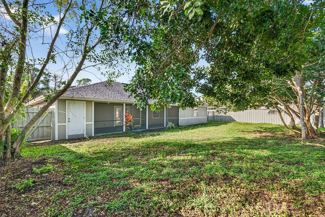 117 High Court Sebastian, FL 32958 - Photo 46 of 54 a view of a house with a yard
