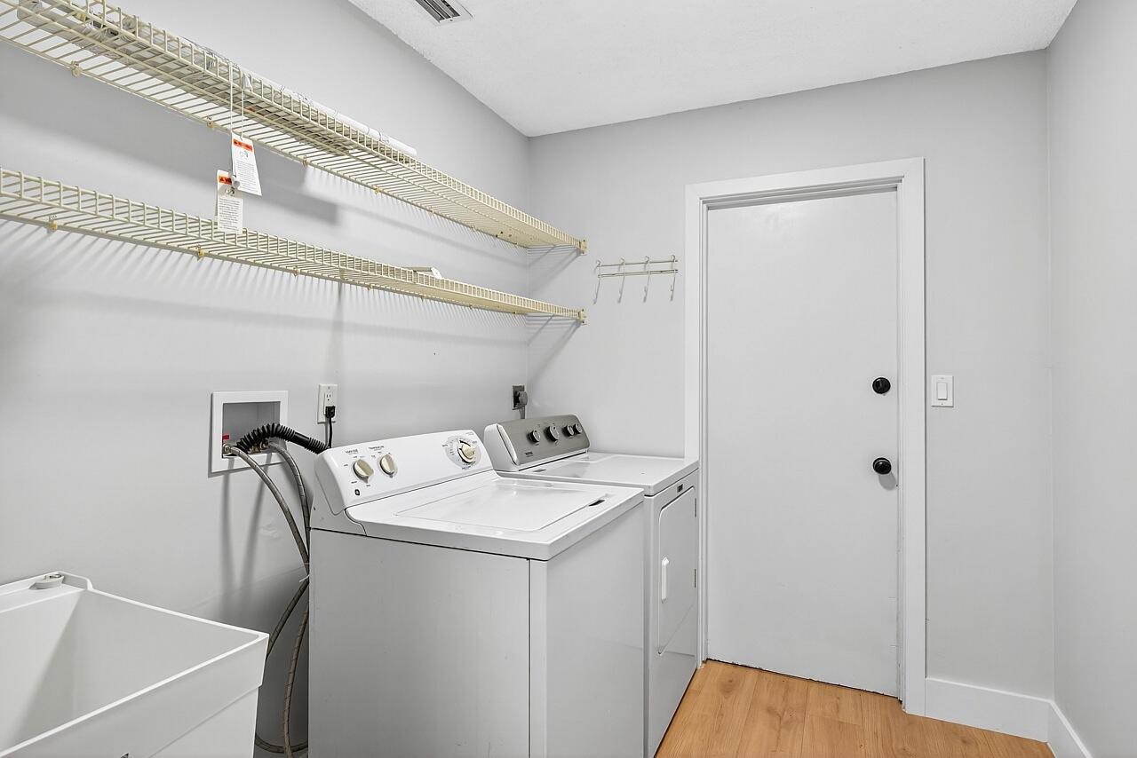 117 High Court Sebastian, FL 32958 - Photo 49 of 54 a utility room with dryer and washer