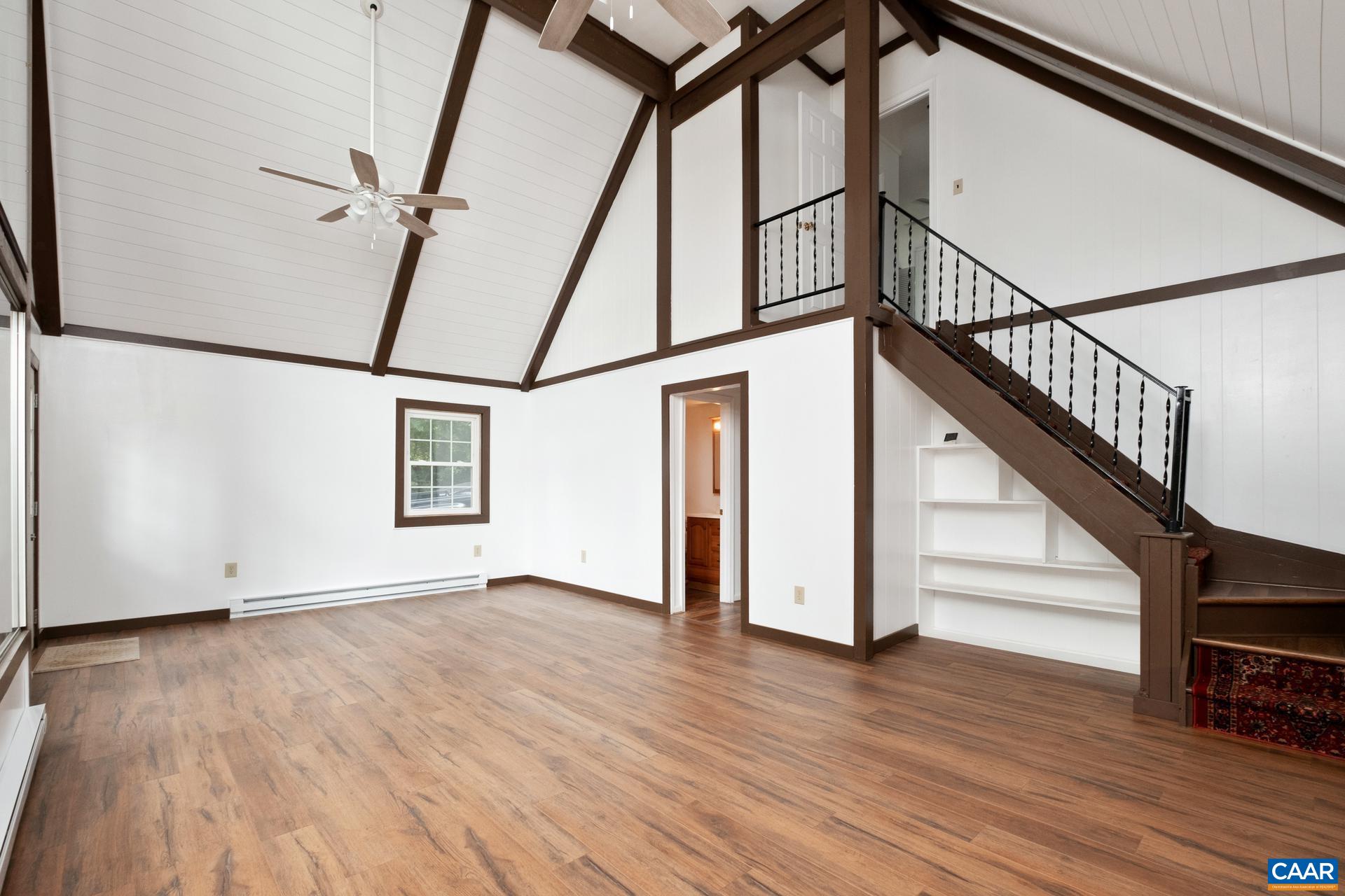 187 Logtrac Road Stanardsville, VA 22973 - Photo 13 of 19 a view of an entryway with wooden floor and stairs