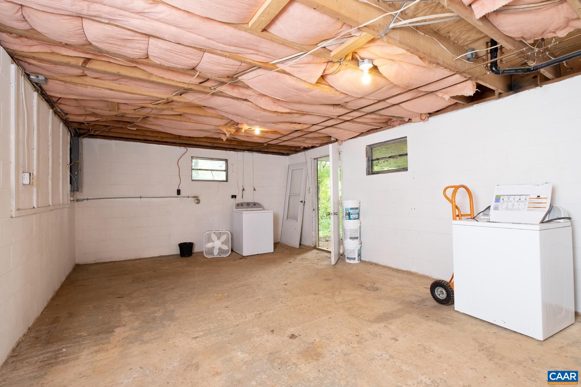 187 Logtrac Road Stanardsville, VA 22973 - Photo 19 of 19 a view of a storage & utility room with multiple dryer and washer