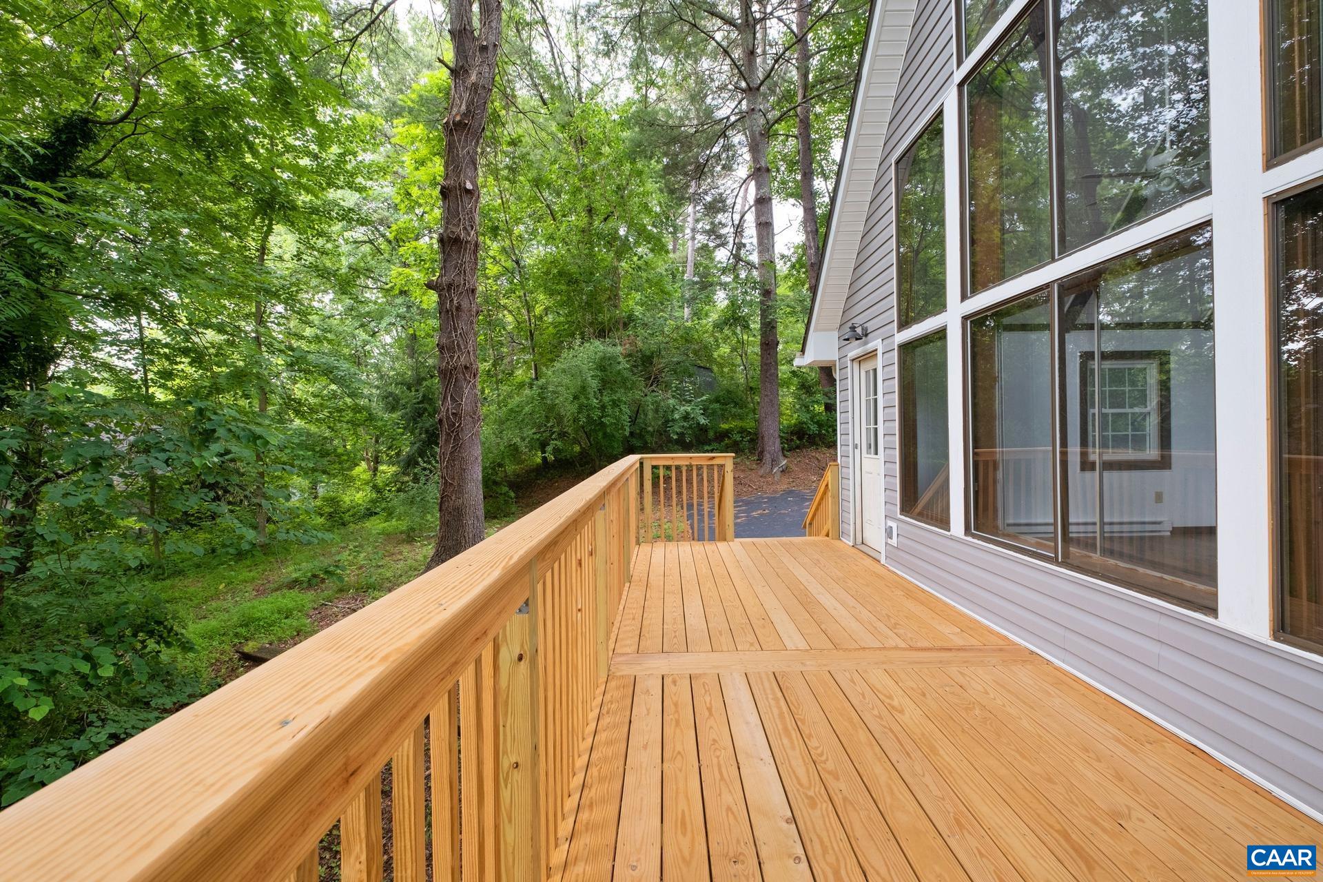 187 Logtrac Road Stanardsville, VA 22973 - Photo 5 of 19 a view of balcony with wooden floor and fence