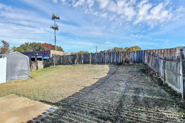 a view of a chairs and table in the patio