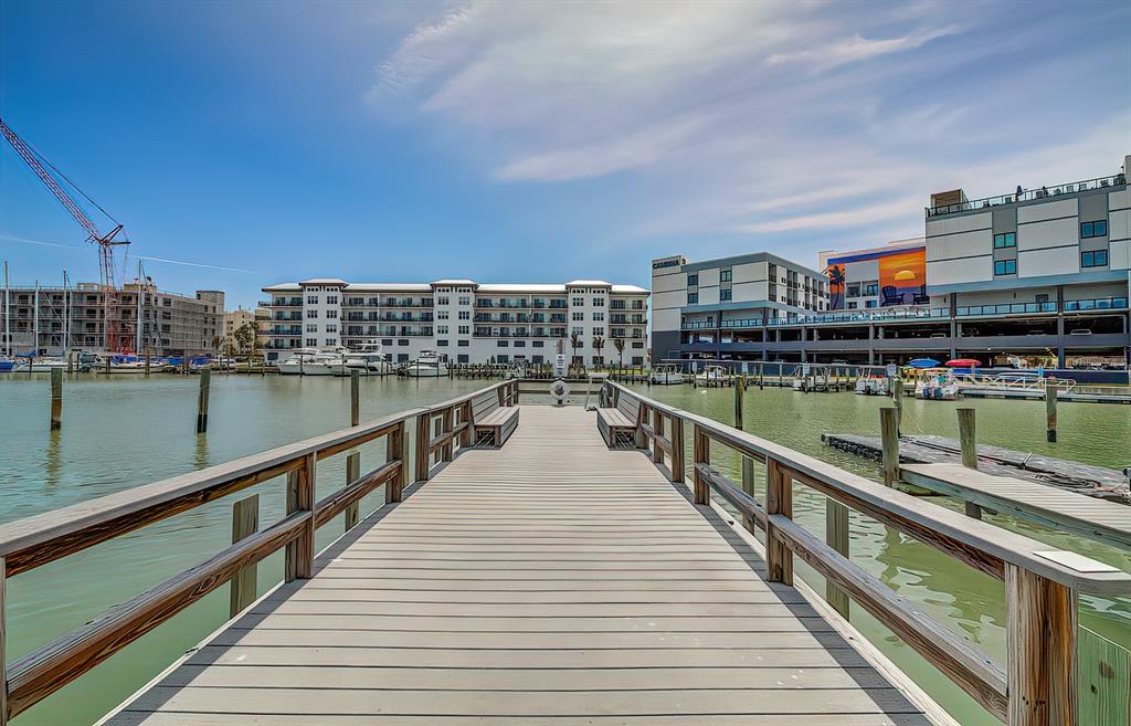 161 Medallion Boulevard, Unit E Madeira Beach, FL 33708 - Photo 2 of 19 a view of city from a balcony