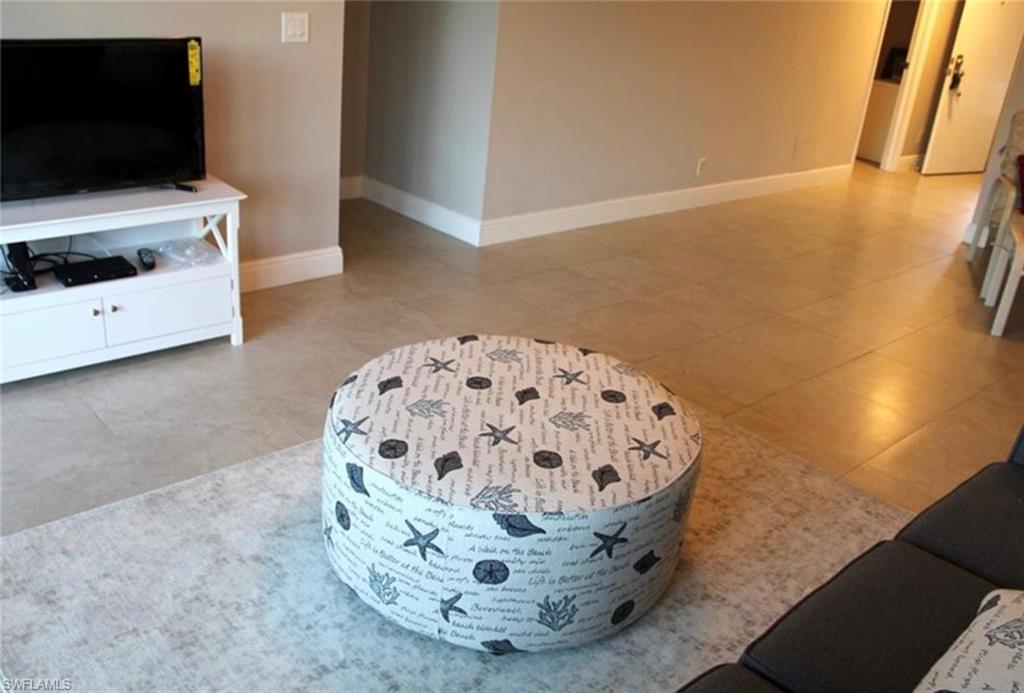 1085 Forest Lakes Drive, Unit 8106 Naples, FL 34105 - Photo 5 of 27 a view of a livingroom with furniture
