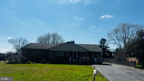 a view of a house with a garden