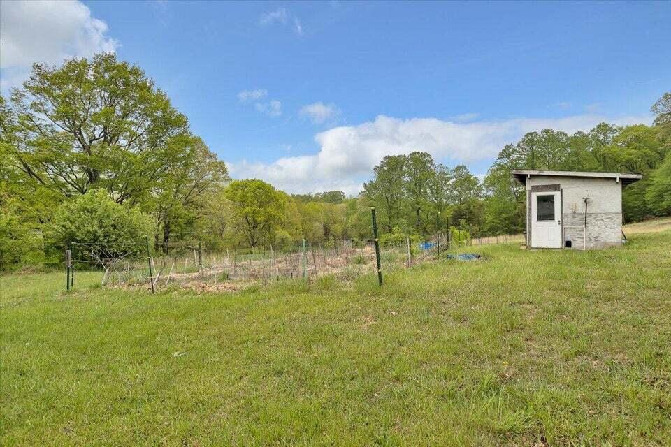 1038 Adelaide Lane Blue Ridge, VA 24064 - Photo 4 of 23 a view of a house with a backyard