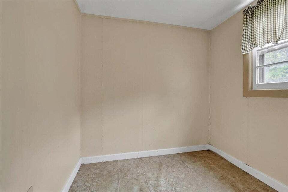 1038 Adelaide Lane Blue Ridge, VA 24064 - Photo 10 of 23 a view of an empty room with a window