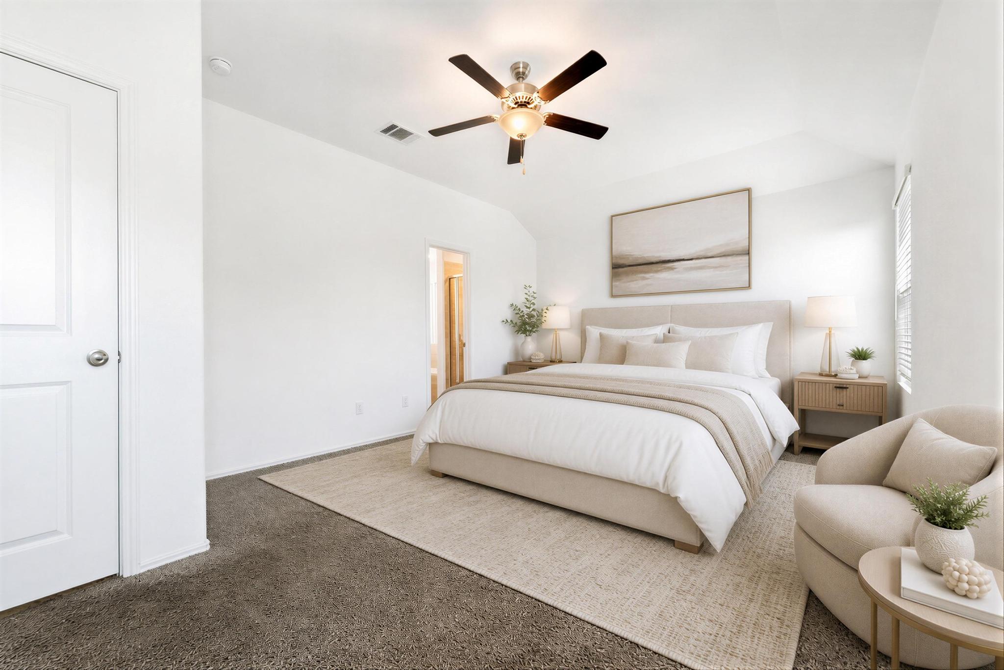 133 Konik Road Georgetown, TX 78626 - Photo 9 of 29 a bedroom with a large bed and a ceiling fan