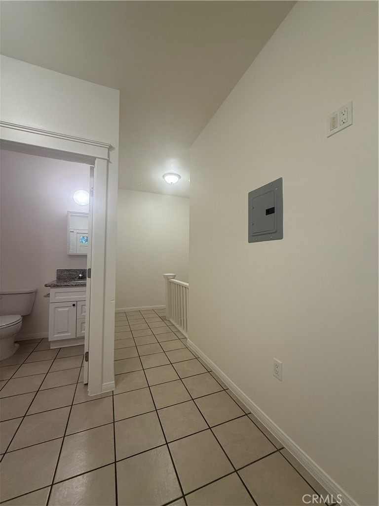 718 Chestnut Avenue, Unit 4 Long Beach, CA 90813 - Photo 6 of 11 a bathroom with a sink and a toilet