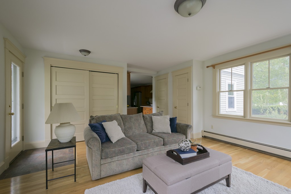 4 Reed Street Lexington, MA 02421 - Photo 17 of 30 a living room with furniture and a window