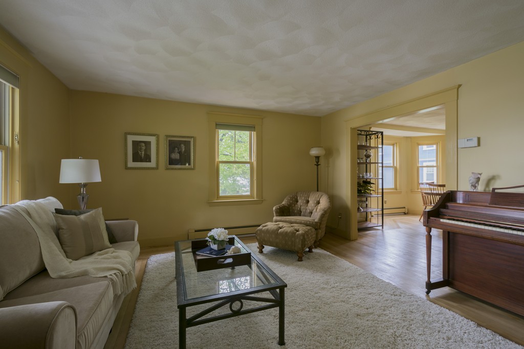 4 Reed Street Lexington, MA 02421 - Photo 4 of 30 a living room with furniture and a window
