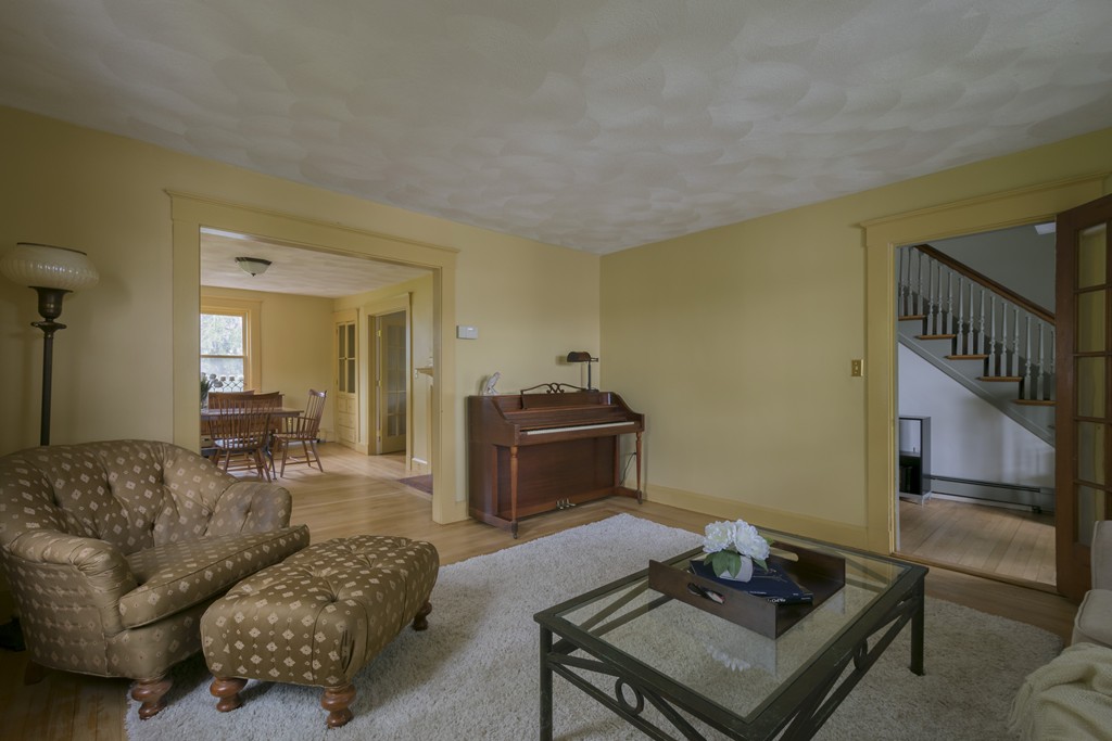 4 Reed Street Lexington, MA 02421 - Photo 5 of 30 a living room with furniture and a window